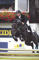 Søren Knudsen of Denmark riding Cajus to a bronze medal at the 2000 World Cham-pionships for 6 year old jumping horses at Arnhem.